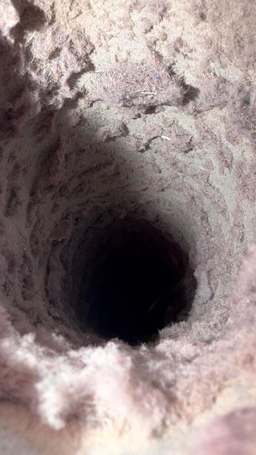 Dryer vent line packed solid with lint before L&L's cleaning