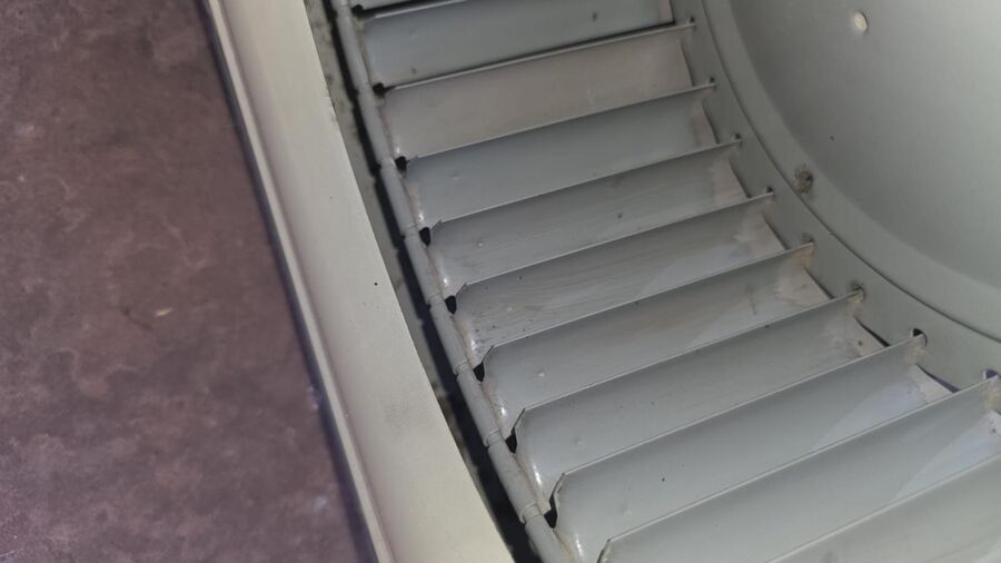 Blower housing louvers clean after L&L's HVAC cleaning