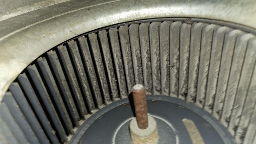 Blower wheel caked with dust before L&L's HVAC cleaning